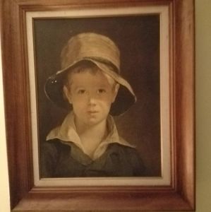 The boy with the torn hat